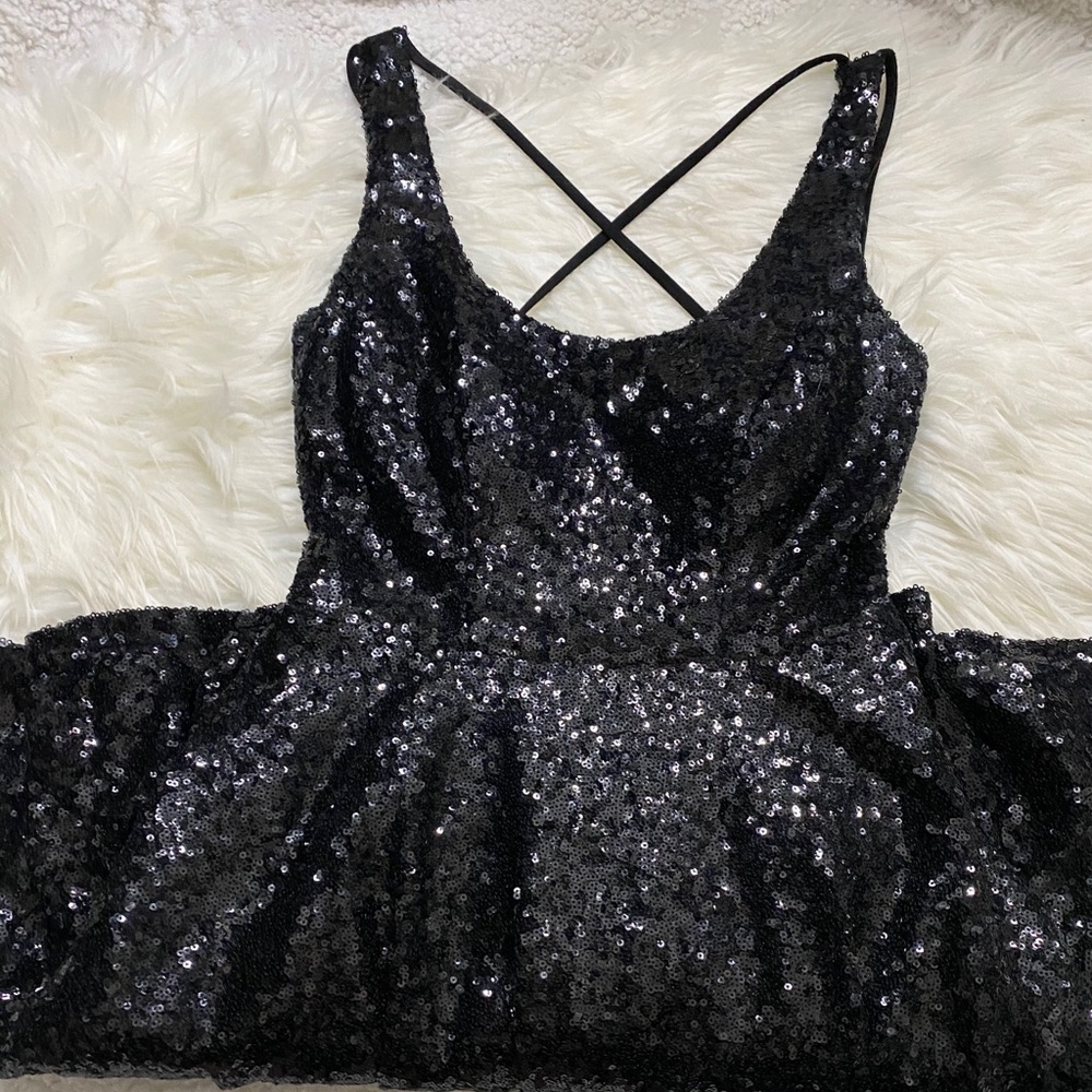 black sequin flowy dress
